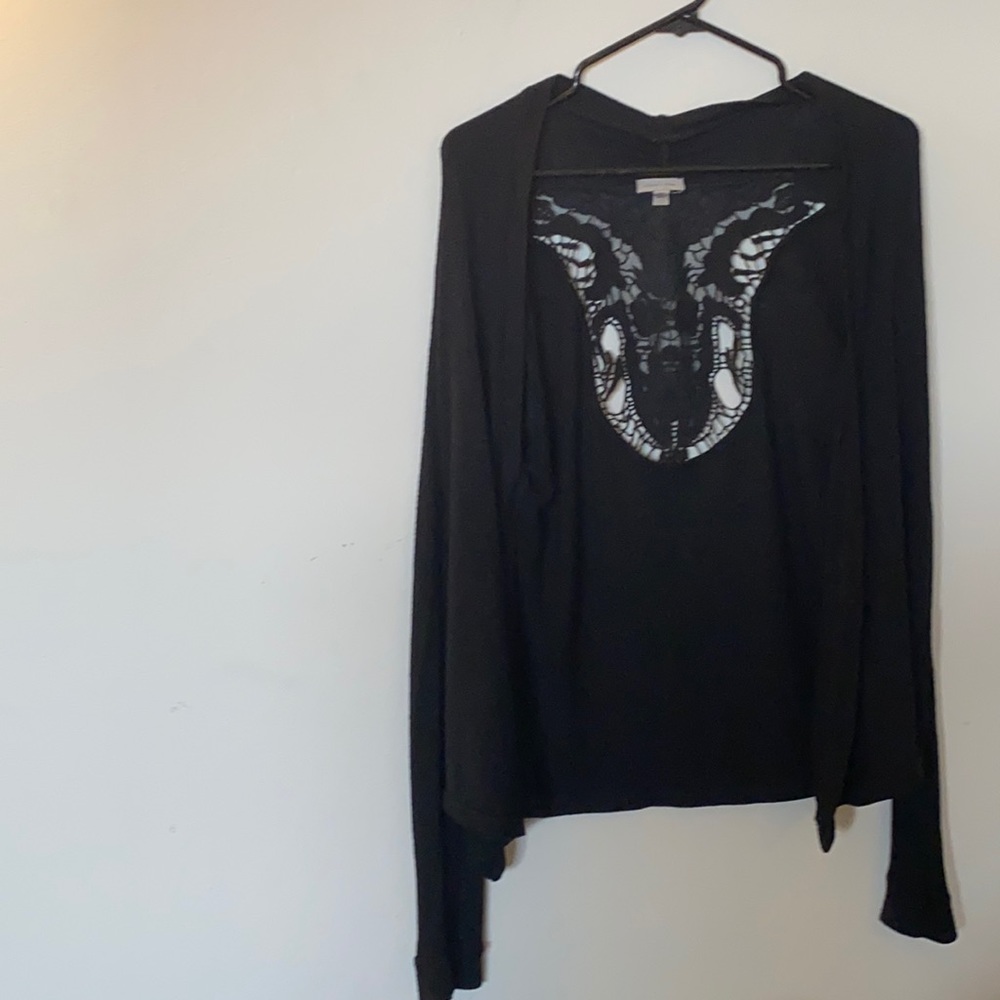 Cardigan with a cut out pattern in the back